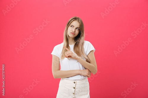 Fotografie, Obraz Shot of bored annoyed beautiful teenage girl with straight blond hair looking at