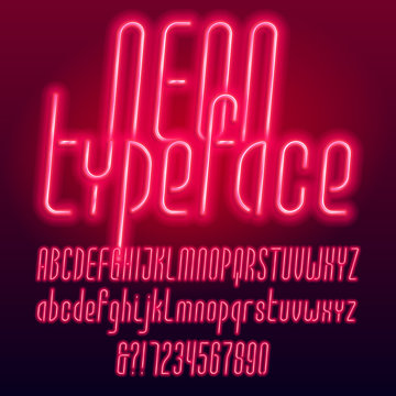 Red neon tube alphabet typeface. Neon color uppercase and lowercase letters, numbers and symbols. Stock vector font for your design.