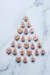 Wall Mural - Festive Christmas advent calendar made from wooden shapes