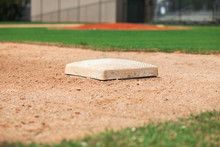 Close Up Low Angle View Of Third Base On A Youth Baseball Field