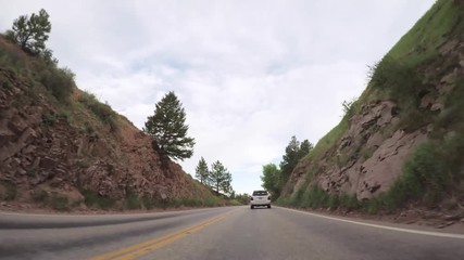 Wall Mural - Driving on paved road in Rocky Mountain National Park