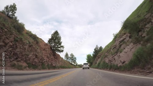 Fototapete - Driving on paved road in Rocky Mountain National Park