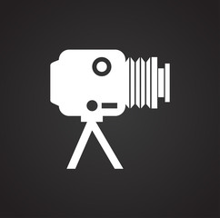 Poster - Studio film photo camera icon on black background for graphic and web design, Modern simple vector sign. Internet concept. Trendy symbol for website design web button or mobile app