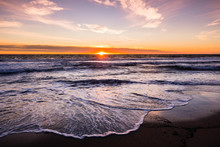 Sunset View Of Malibu Beach, The Pacific Ocean Coastline, Los Angeles County, California