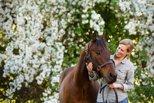 Woman And Horse In Springtime