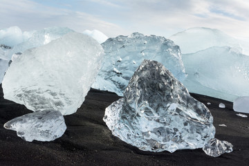  View of the ice floes in the sea, and beach in Jökulsárlón, Iceland