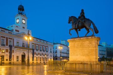 Wall Mural - Night view in Madrid Puerta del Sol square Km 0 in Madrid, Spain.