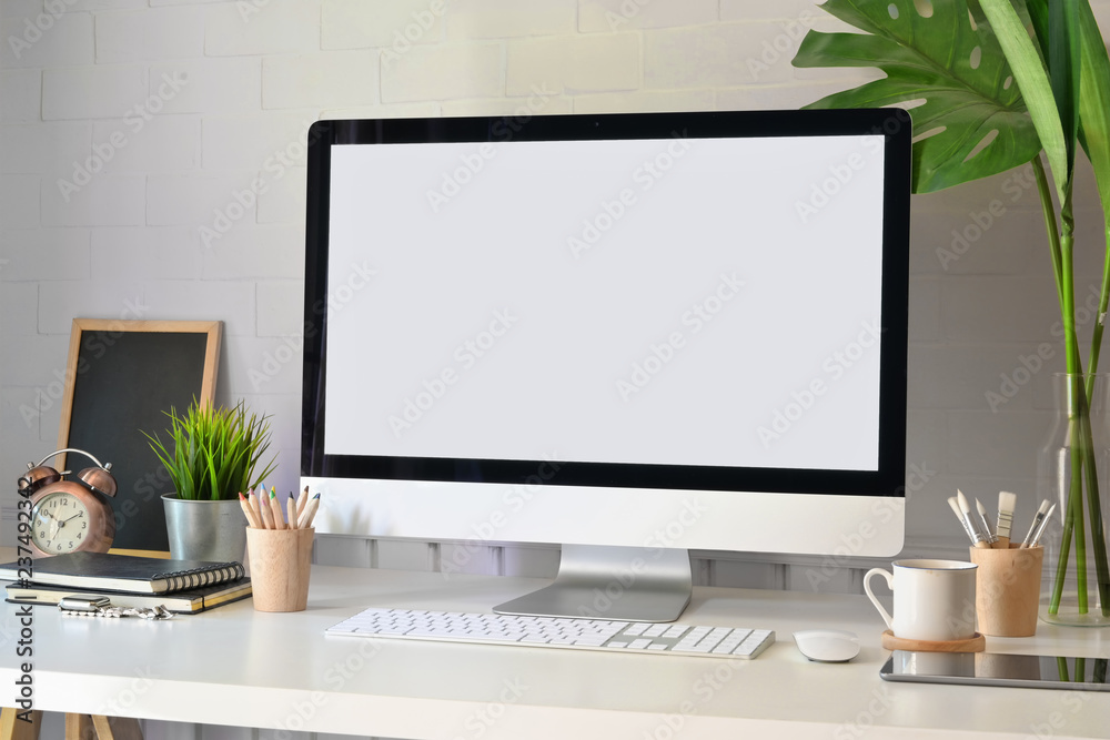 Mockup modern blank screen desktop computer on stylish workspace. - obrazy, fototapety, plakaty 