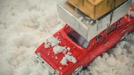 Wall Mural - Red model car with presents on its roof combined with falling snow