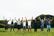 © Rawpixel.com - Happy diverse people holding hands in the park