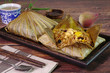 Rice wrapped in lotus leaf. Vegetarian food. Thai - Chinese food.