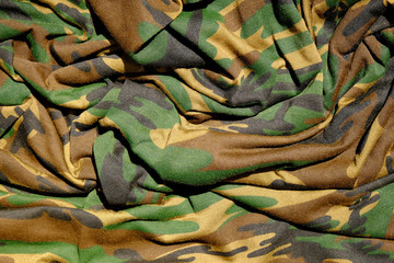 Camouflage fabric texture crumpled background