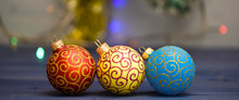 Decorate Christmas Tree With Traditional Toys. Symbol Of New Year And Christmas Holidays. Various Christmas Decorations. Christmas Balls Decoration On Blue Wooden Surface. Winter Holiday Concept