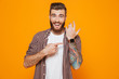 © Drobot Dean - Portrait of a cheerful young man wearing casual clothes