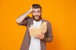 © Drobot Dean - Portrait of an excited young man wearing casual clothes