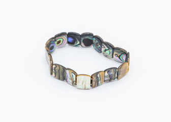 metal bracelet made with square shell inlays