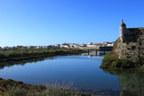 Fototapeta Na drzwi - detail of ancient fortification in the city of Peniche in Portugal lined with water and its reflections