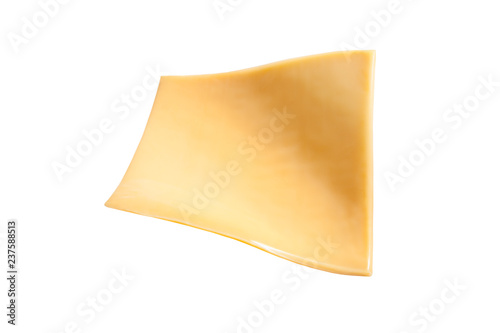 Foto  Yellow cheese slices isolated on white background.