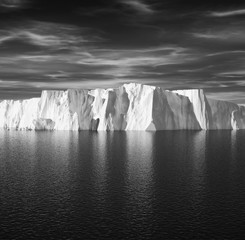 Wall Mural - View of iceberg with beautiful transparent sea on background.