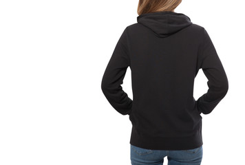 Wall Mural - young girl in black sweatshirt, black hoodies rear view isolated on white background.