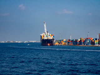 Container ships in the port of Male in the Maldives