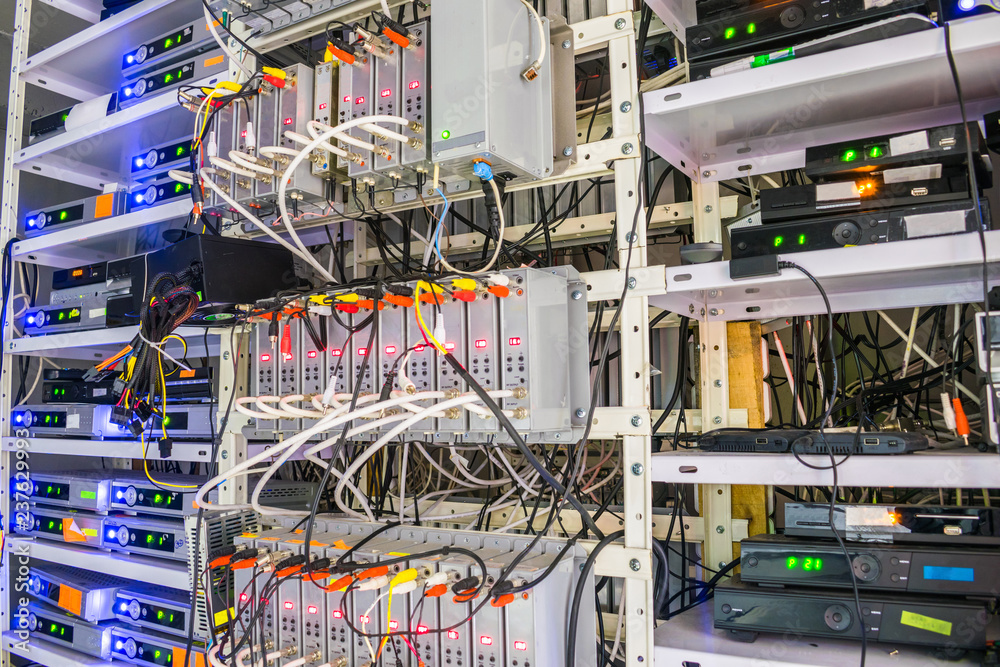 Network Rack Tv Racks with telecommunication equipment is in the server room of the ...