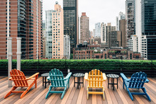 Chairs On A Rooftop And View Of Turtle Bay, In Midtown Manhattan, New York City
