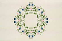  Pattern For Embroidery Of Oval Ornament Of Bouquets With Blue-bluish And Pink Flowers On Twisted Stems With Leaves On Cotton Fabric

