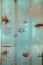 Old And Rusty Emerald Color Metallic Doors