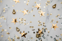 Gold Star Sparkle Party Confetti On A Marble Flat Lay Background