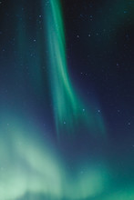 Northern Lights And Stars On The Night Sky. Murmansk Region, Russia