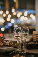 bar interior empty wine glasses and bokeh