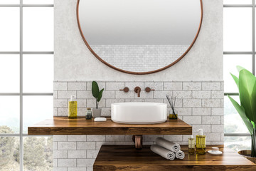 Sink close up in brick bathroom interior