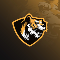 Wall Mural - tiger mascot logo design vector with modern illustration concept style for badge, emblem and tshirt printing. angry tiger head illustration with shield.