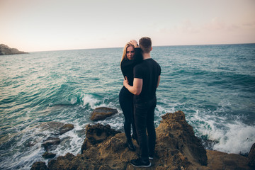 Wall Mural - Couple in love on the background of the sea