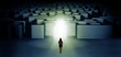 © ra2 studio - Lost woman standing at the dark labyrinth with illuminated door