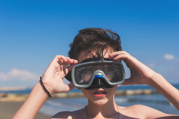 Wall Mural - Closeup of boy face in the snorkeling mask. Travel and summer concept