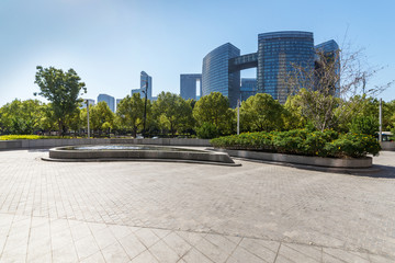 Leinwandbilder - buildings with empty concrete square floor，Qianjiang New Town，hangzhou,china