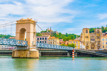 Poster - Cathedral in Vienne viewed behind a pedestrian bridge over river Rhone, France