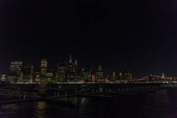 Fototapete - Manhattan skyline panorama with Times Square lights at dusk, New York City