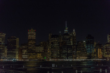 Wall Mural - Manhattan skyline panorama with Times Square lights at dusk, New York City