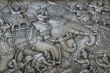 Wall Mural - Thai style silver carving art on temple wall , Wat Srisuphan ,Chiang Mai, Thailand.