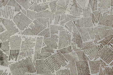 black and white repeating torn newspaper background. continuous pattern left, right, up and down