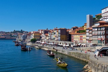 Wall Mural - View of old Porto waterfront next to Douro River in Portugal