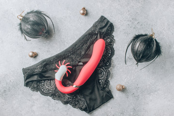 Wall Mural - vibrator, christmas balls, lace panties. New Year or Christmas festive background for Sex shop