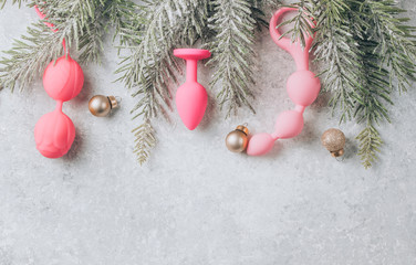 Wall Mural - Various sex toys, christmas balls. New Year or Christmas festive background for Sex shop