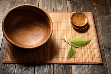 Wall Mural - Empty wooden bowl on natural background