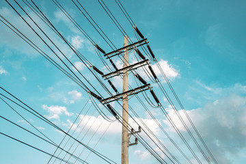 High voltage electricity pylon for electric supply transmission with blue sky, Power distribution technology and generator infracstructure equipment 