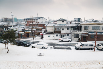 Wall Mural - Snow covered town at winter in Suwon, Korea