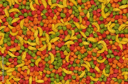 Fotografie, Obraz A colorful abstract background of mixed dried bird treats that contain nutrition for pet parrot birds of all sizes